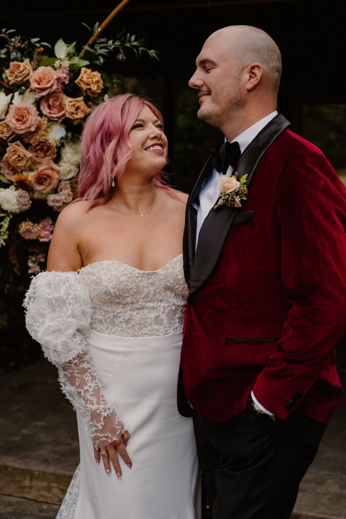 Couple celebrates their wedding ceremony with close family and friends.