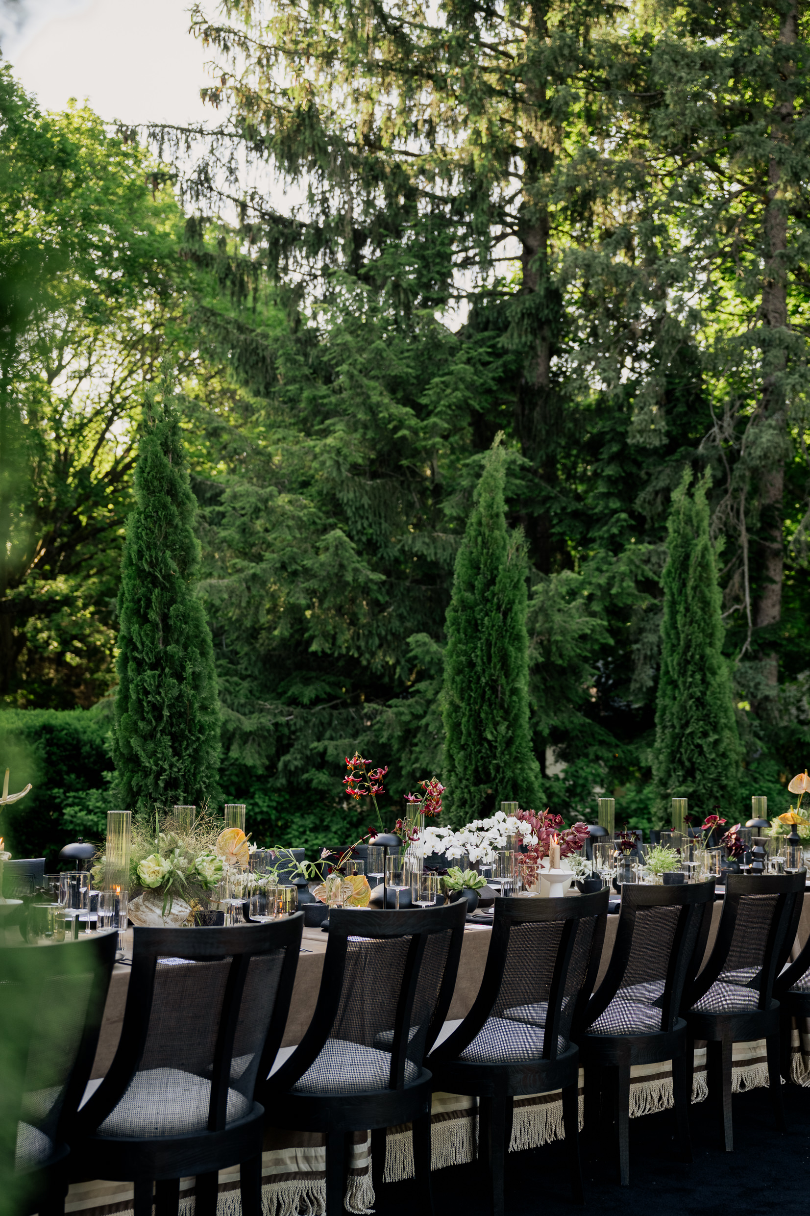 Lush florals, rich textures, and ornate family-style reception tables are coming in 2025.